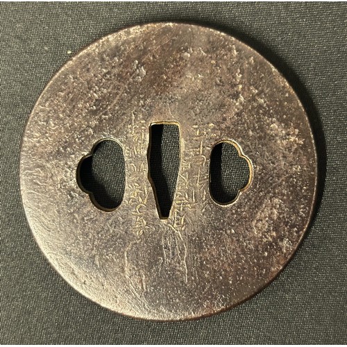 9090 - Japanese Sword Tsuba in bronze, signed. 79mm in diameter.