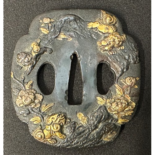 9092 - Japanese Sword Tsuba in bronze, unsigned, featuring Komainu Lion-dogs and Flowers, size 73mm x 68mm.