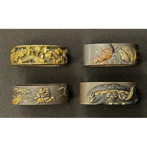 9099 - Japanese Sword Fuchi collection. Four different examples, all signed.