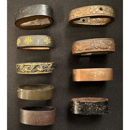 9100 - Japanese Sword Fuchi collection, nine examples, all unsigned. (9)