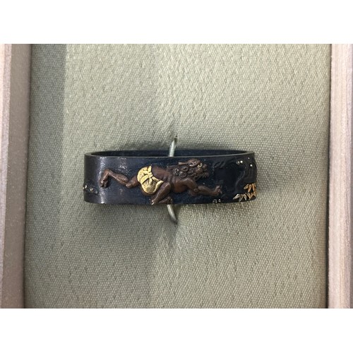 9105 - Japanese Sword Kashira and Fuchi in a wooden display box. Unsigned.