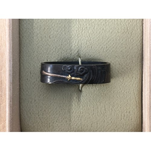 9105 - Japanese Sword Kashira and Fuchi in a wooden display box. Unsigned.