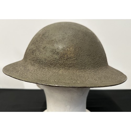 9116 - WW1 US M1917 Steel Helmet. Three holes have been drilled to each side of the rim to allow fitment of... 