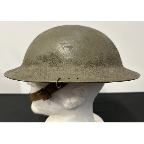 9116 - WW1 US M1917 Steel Helmet. Three holes have been drilled to each side of the rim to allow fitment of... 