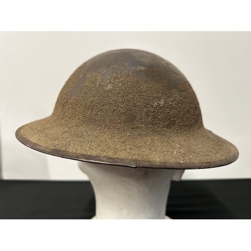 9117 - WW1 British Steel Helmet with original paint. Rim is Heat Treatment Lot number FS101. Complete with ... 