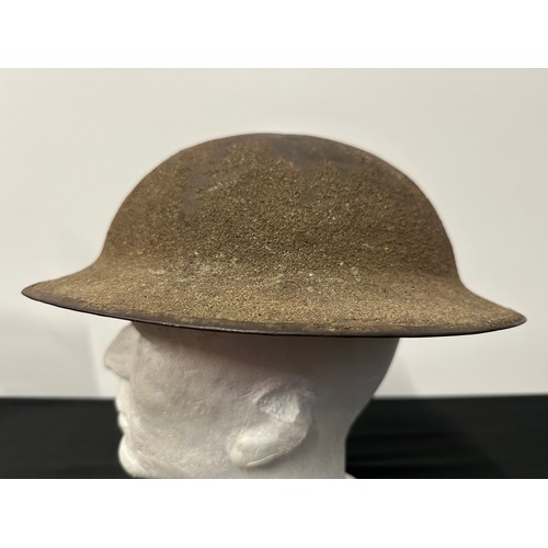 9117 - WW1 British Steel Helmet with original paint. Rim is Heat Treatment Lot number FS101. Complete with ... 