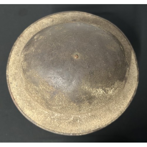 9117 - WW1 British Steel Helmet with original paint. Rim is Heat Treatment Lot number FS101. Complete with ... 