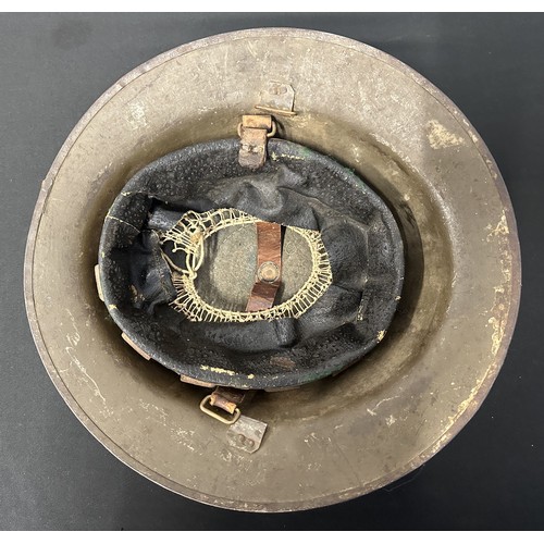 9117 - WW1 British Steel Helmet with original paint. Rim is Heat Treatment Lot number FS101. Complete with ... 