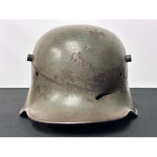 9130 - WW1 Imperial German M16 Helmet Shell with original paint. No liner or chinstrap. Shrapnel damage to ... 