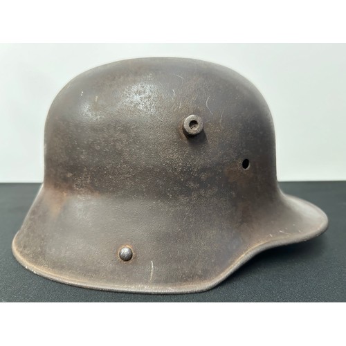 9131 - WW1 Imperial German M16 Helmet Shell, no liner or chinstrap. Dent to top from either demilitarizatio... 