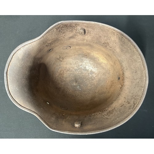 9131 - WW1 Imperial German M16 Helmet Shell, no liner or chinstrap. Dent to top from either demilitarizatio... 