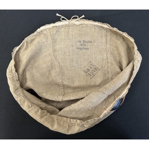 9132 - WW1 Imperial German M16 Helmet Shell complete with original very rare light tan thin cotton camoufla... 