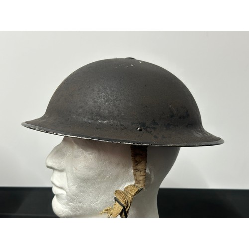 9150 - WW2 British ARP Wardens Steel Helmet with remains of original black painted finish and white 