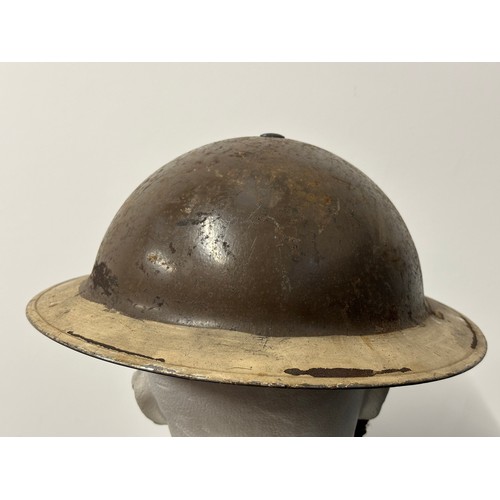 9153 - WW2 British Home Front Fire Service Helmet. Original paint. Complete with web chinstrap. Liner maker... 