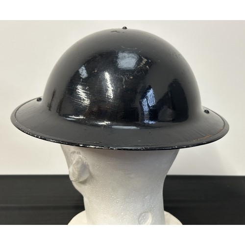 9176 - WW2 British Home Front Police Steel Helmet. Complete with 6 3/4 size liner which is maker marked and... 