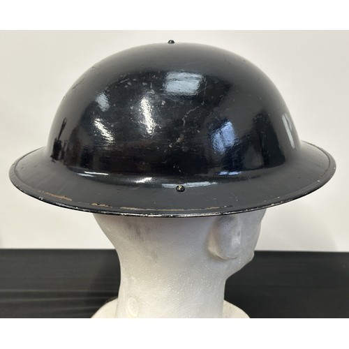 9176 - WW2 British Home Front Police Steel Helmet. Complete with 6 3/4 size liner which is maker marked and... 