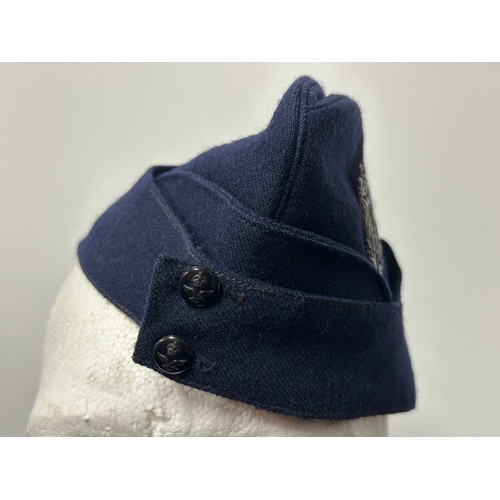 9181 - WW2 RAAF Field Service cap in dark blue wool complete with bronze RAAF cap badge. Maker marked and d... 