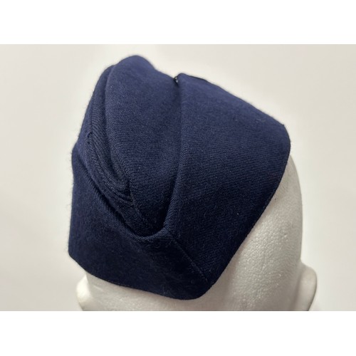 9181 - WW2 RAAF Field Service cap in dark blue wool complete with bronze RAAF cap badge. Maker marked and d... 