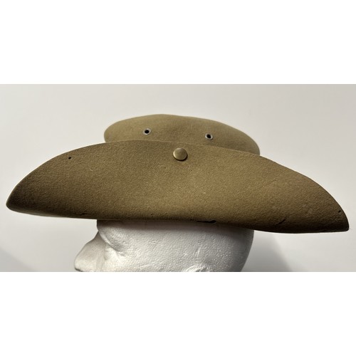 9215 - WW2 British Bush Hat with blue triangle formation sign to side of hat. Single cloth band Pugree. Fou... 