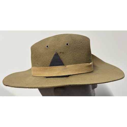 9215 - WW2 British Bush Hat with blue triangle formation sign to side of hat. Single cloth band Pugree. Fou... 