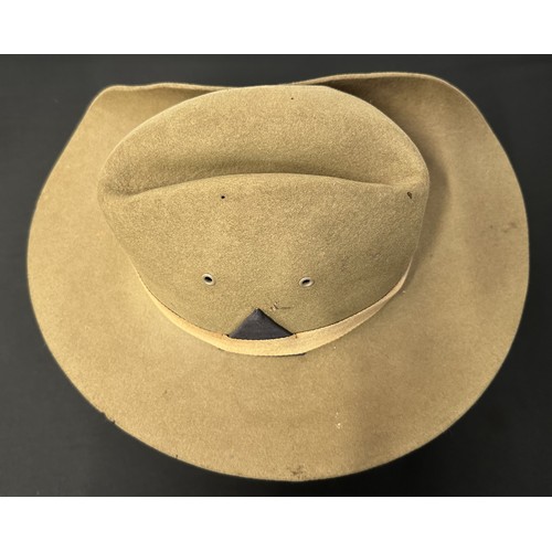 9215 - WW2 British Bush Hat with blue triangle formation sign to side of hat. Single cloth band Pugree. Fou... 