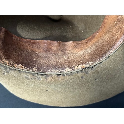 9215 - WW2 British Bush Hat with blue triangle formation sign to side of hat. Single cloth band Pugree. Fou... 