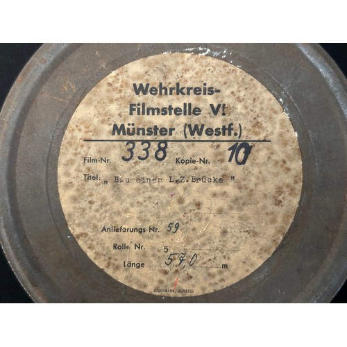 9230 - WW2 Third Reich Film Reels Cans x 2. Both contains original films. One is labled 