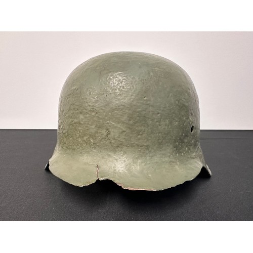 9235 - WW2 Third Reich M42 pattern steel helmet in relic condition. Repainted. No liner.