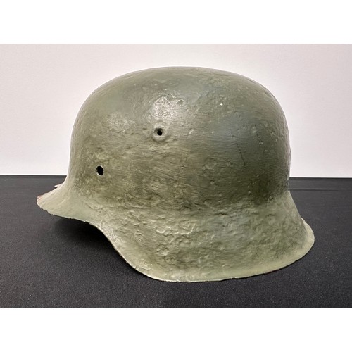 9235 - WW2 Third Reich M42 pattern steel helmet in relic condition. Repainted. No liner.