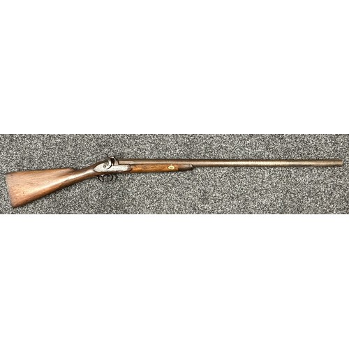 9323 - A single barrel percussion cap shotgun with 825mm long barrel. Bore approx. 23mm. Action holds at bo... 