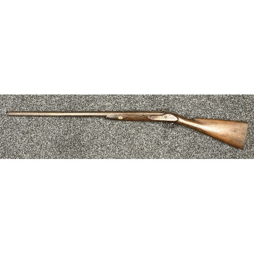 9323 - A single barrel percussion cap shotgun with 825mm long barrel. Bore approx. 23mm. Action holds at bo... 