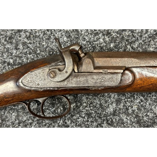 9323 - A single barrel percussion cap shotgun with 825mm long barrel. Bore approx. 23mm. Action holds at bo... 