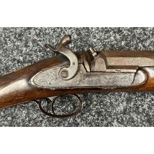 9323 - A single barrel percussion cap shotgun with 825mm long barrel. Bore approx. 23mm. Action holds at bo... 