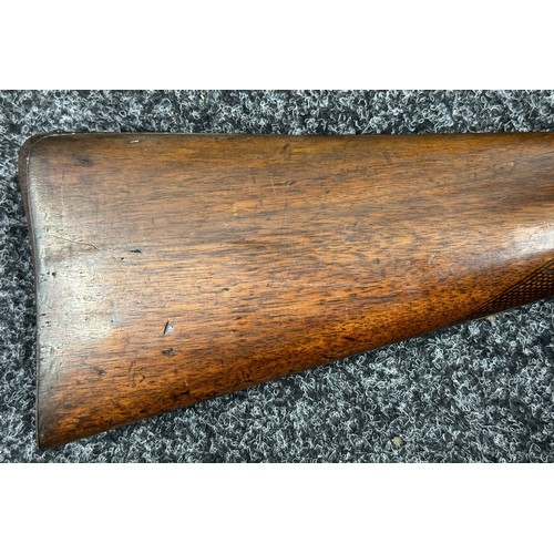 9323 - A single barrel percussion cap shotgun with 825mm long barrel. Bore approx. 23mm. Action holds at bo... 