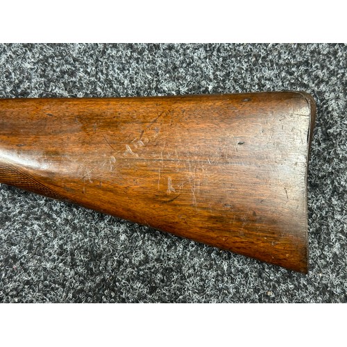 9323 - A single barrel percussion cap shotgun with 825mm long barrel. Bore approx. 23mm. Action holds at bo... 