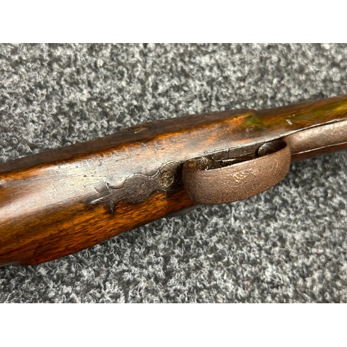 9323 - A single barrel percussion cap shotgun with 825mm long barrel. Bore approx. 23mm. Action holds at bo... 