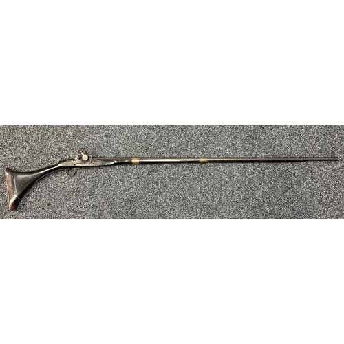 9329 - North African Flintlock Musket with 127cm long barrel. Bore approx. 15mm. Working action which holds... 