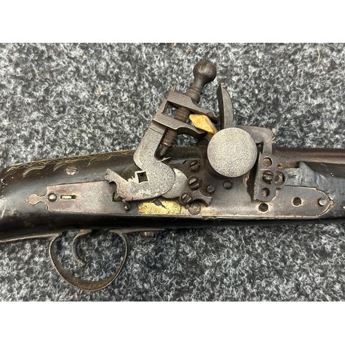 9329 - North African Flintlock Musket with 127cm long barrel. Bore approx. 15mm. Working action which holds... 