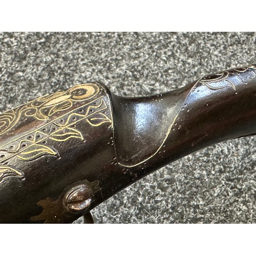 9329 - North African Flintlock Musket with 127cm long barrel. Bore approx. 15mm. Working action which holds... 