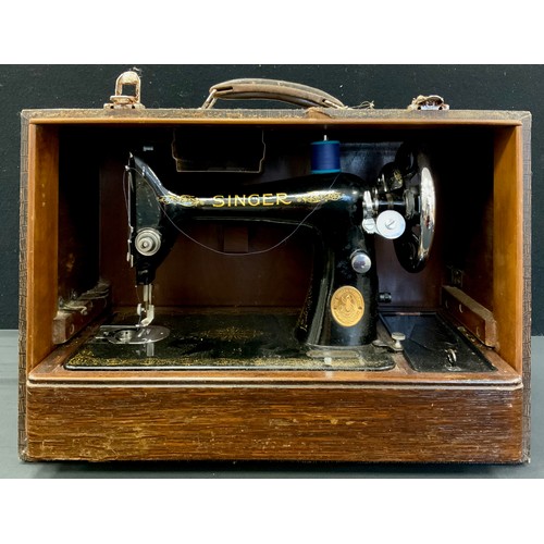 241 - A Singer hand operated Sewing Machine, no.EC563369