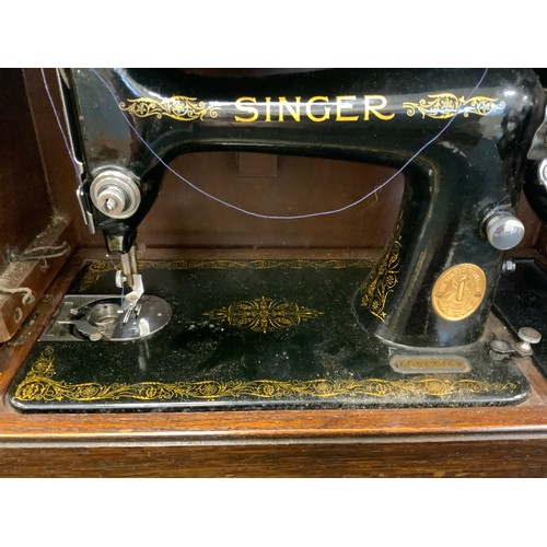 241 - A Singer hand operated Sewing Machine, no.EC563369