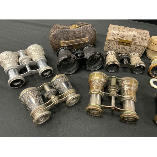 249 - Binoculars & Opera Glasses, a pair of late Victorian silver mounted opera glasses, embossed floral b... 