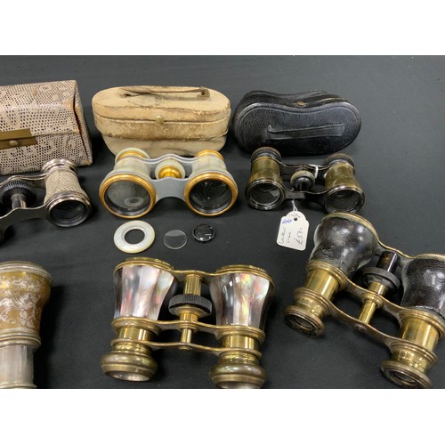 249 - Binoculars & Opera Glasses, a pair of late Victorian silver mounted opera glasses, embossed floral b... 