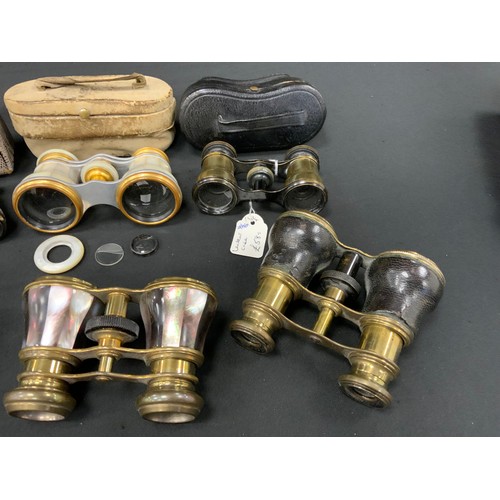 249 - Binoculars & Opera Glasses, a pair of late Victorian silver mounted opera glasses, embossed floral b... 