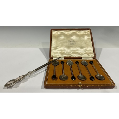 63 - Hallmarked silver coffee spoons and silver handled button hook