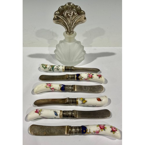 90 - A set of six miniature knives, with porcelain handles; an Art Nouveau scent bottle