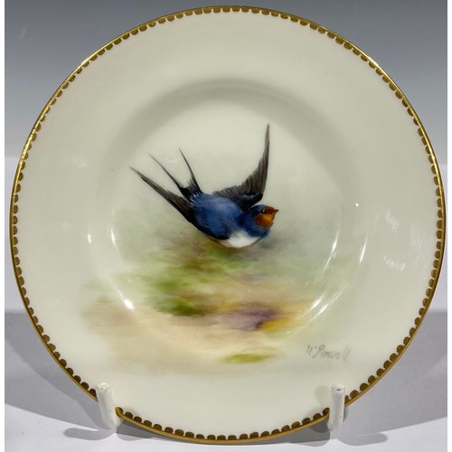 93 - A Royal Worcester plate, decorated by W. Powell, signed, painted with a swallow bird, 12cm diameter,... 