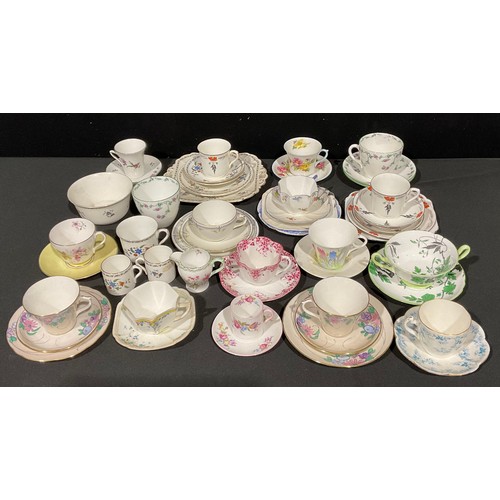 150 - A collection of Shelley teaware, various patterns including Chelsea, Chippendale, etc, some trios, q... 