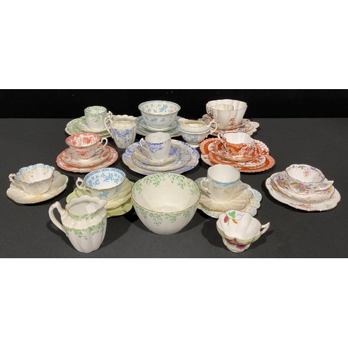 154 - A collection of Wileman & Co. teaware, late 19th/early 20th century, part services, some trios, vari... 