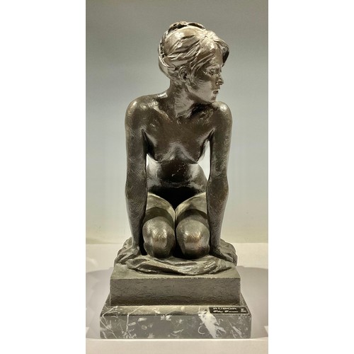 158 - Pilar Francesch, after, a patinated bronze, Rubor, of a female nude, kneeling on a throw, rectangula... 